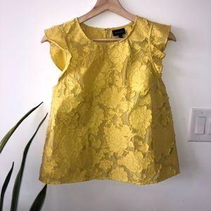 Yellow textured cap sleeved blouse